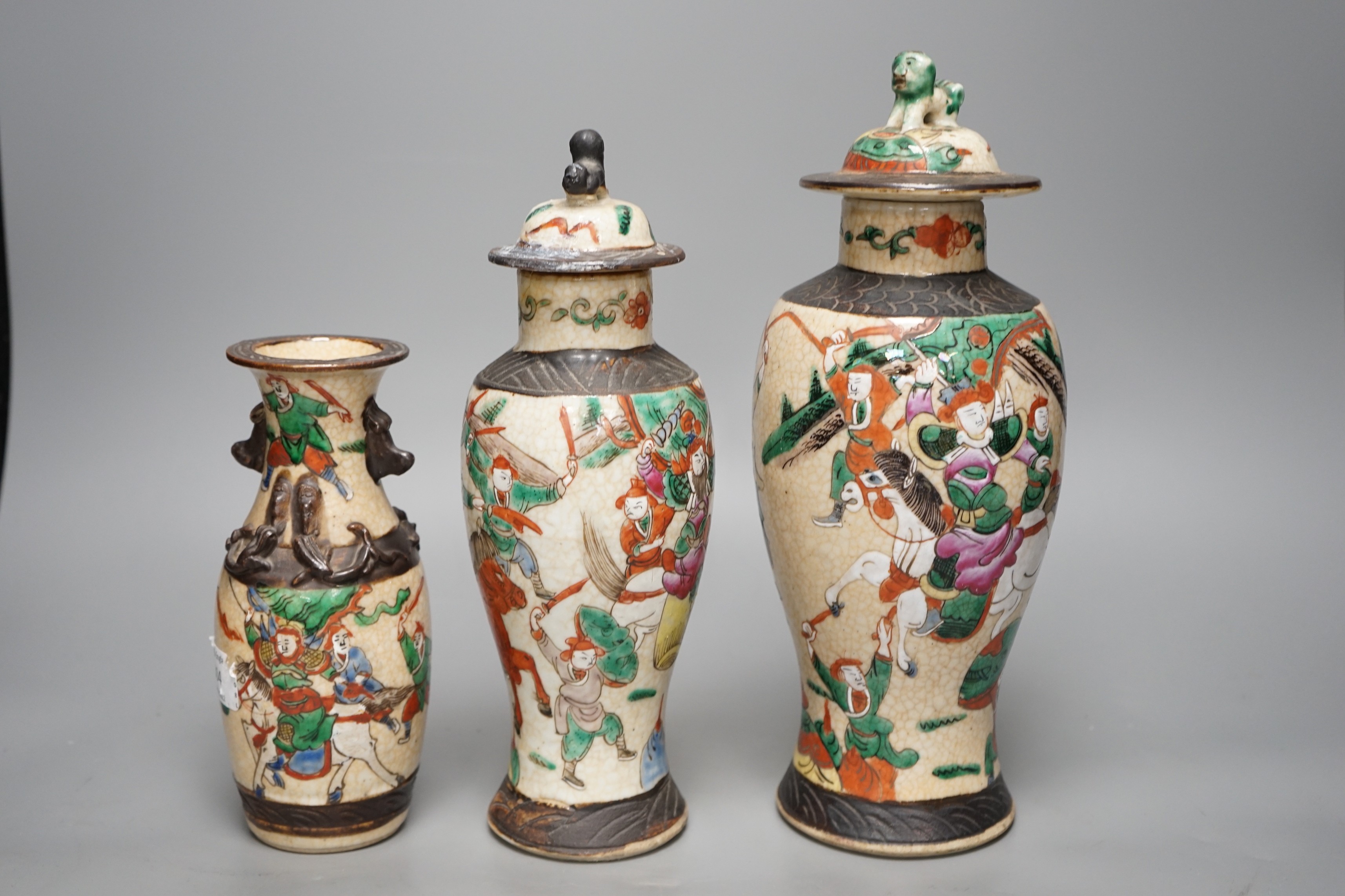 Three Chinese crackle glaze 'warrior' vases, late 19th/early 20th century 30cm